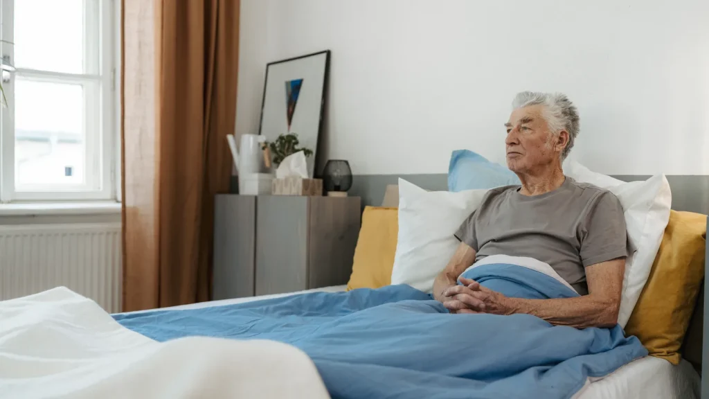 Pressure-relief mattress on a patient's bed for home care support.